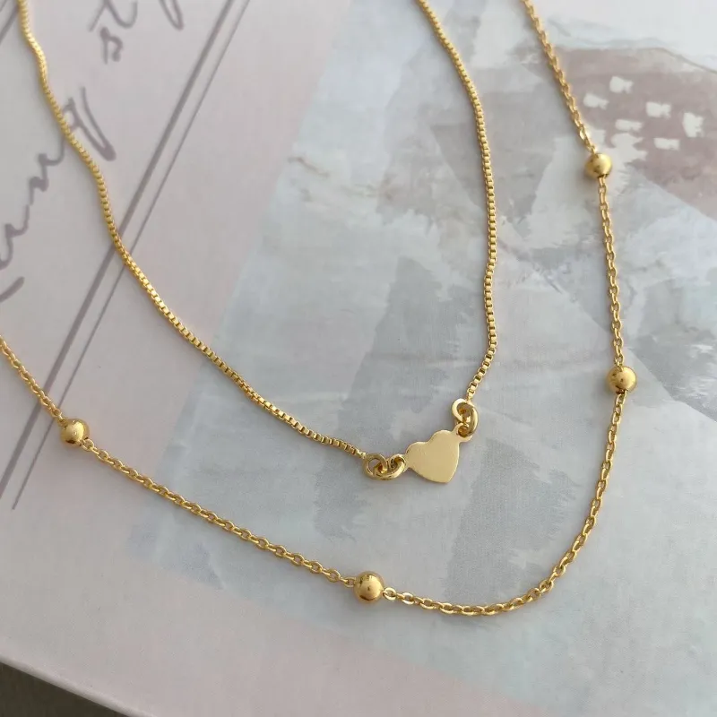 Tornozeleira Coração Pequeno Liso Banho Ouro 18k Semijoia